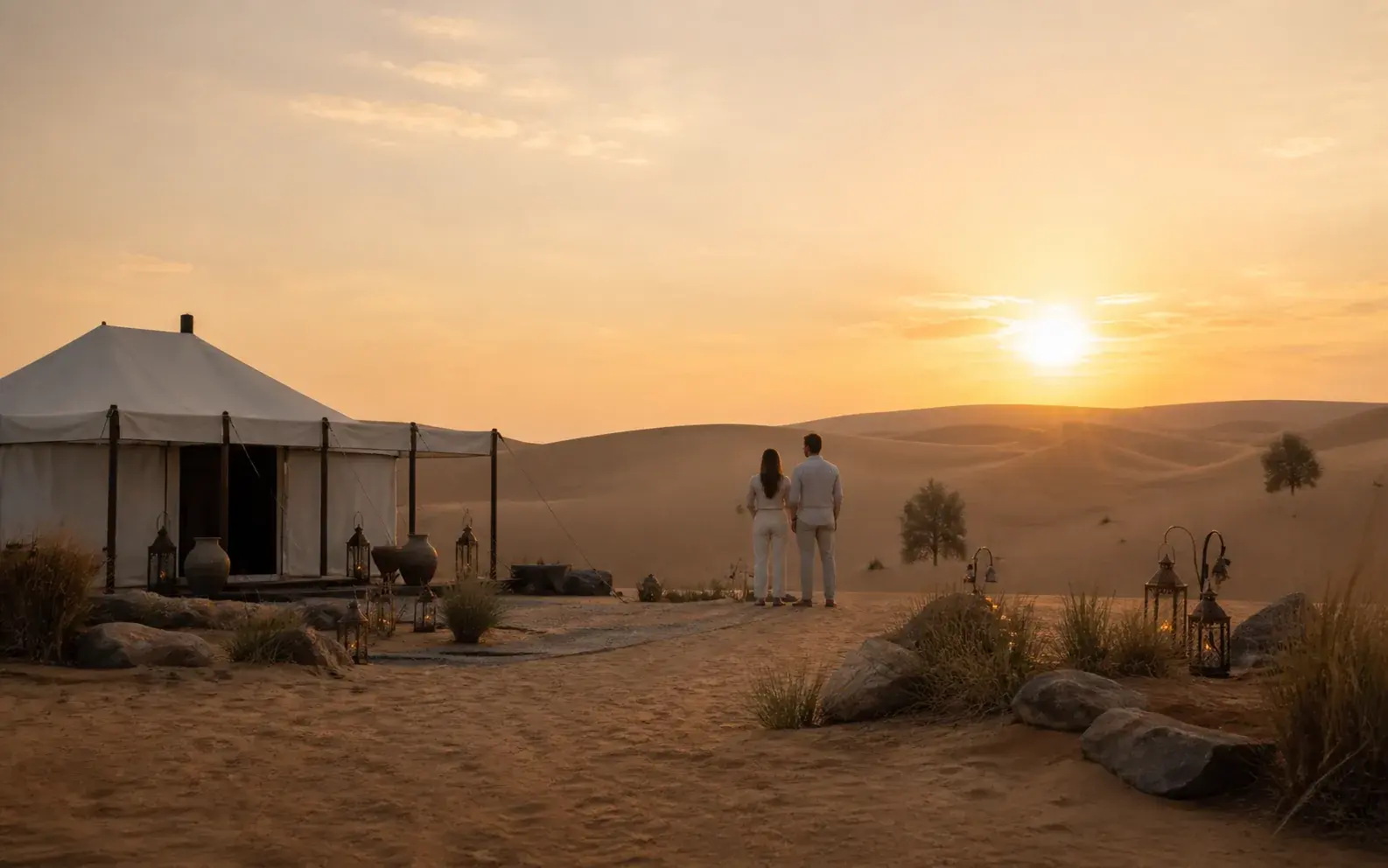 Sunrise light over a quiet desert camp